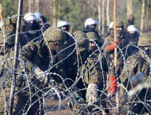 polonia migranti bielorussia scontro 