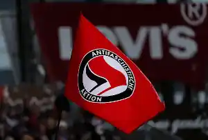 hamburg germany st pauli fans show their support with a antifaschistische aktion flag during
